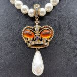 Faux pearl crown pendant necklace