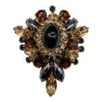amber-colored rhinestone brooch