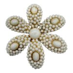 Vintage white milk glass flower brooch.