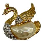 1980s jeweled swan figural brooch.