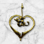 Vintage Brutalist bronze heart pendant.