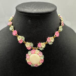 Vintage celluloid flower necklace marked Japan.