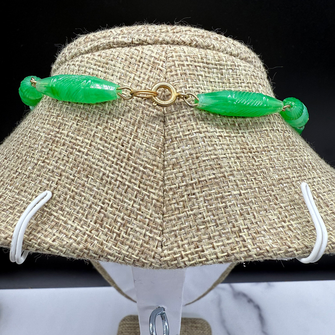 Green faux jade plastic necklace back.