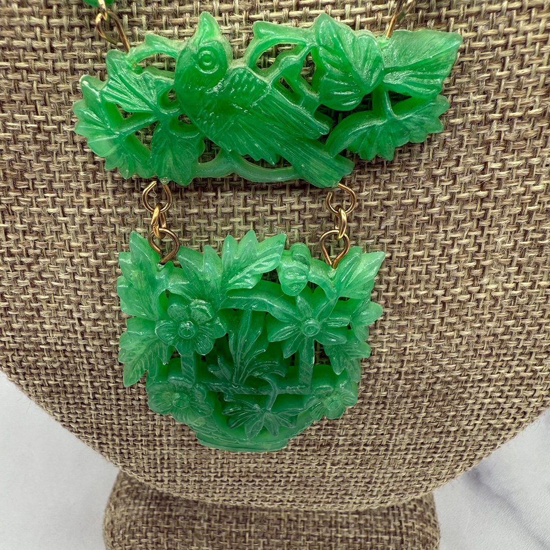 Green faux jade plastic necklace upclose.