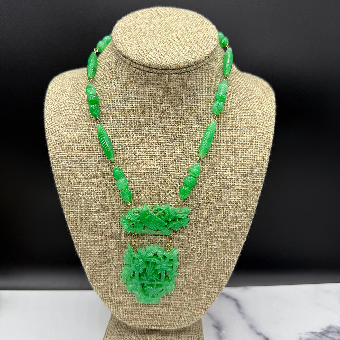 Green faux jade plastic necklace.