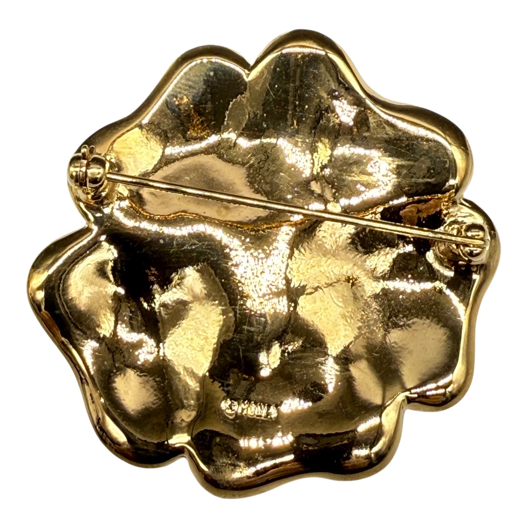 Monet green rhinestone flower brooch.