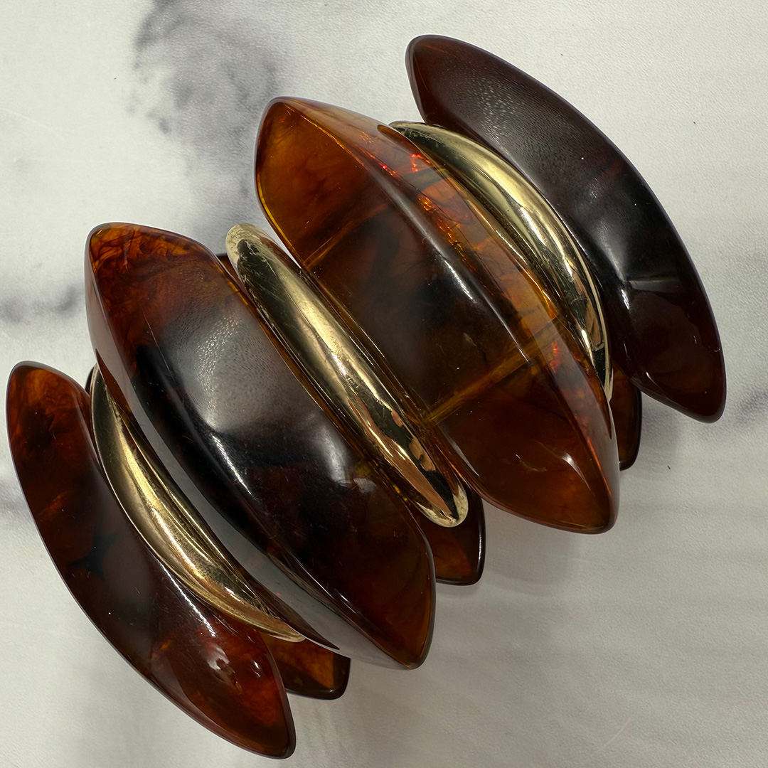 Amber-colored Lucite stretch bracelet.