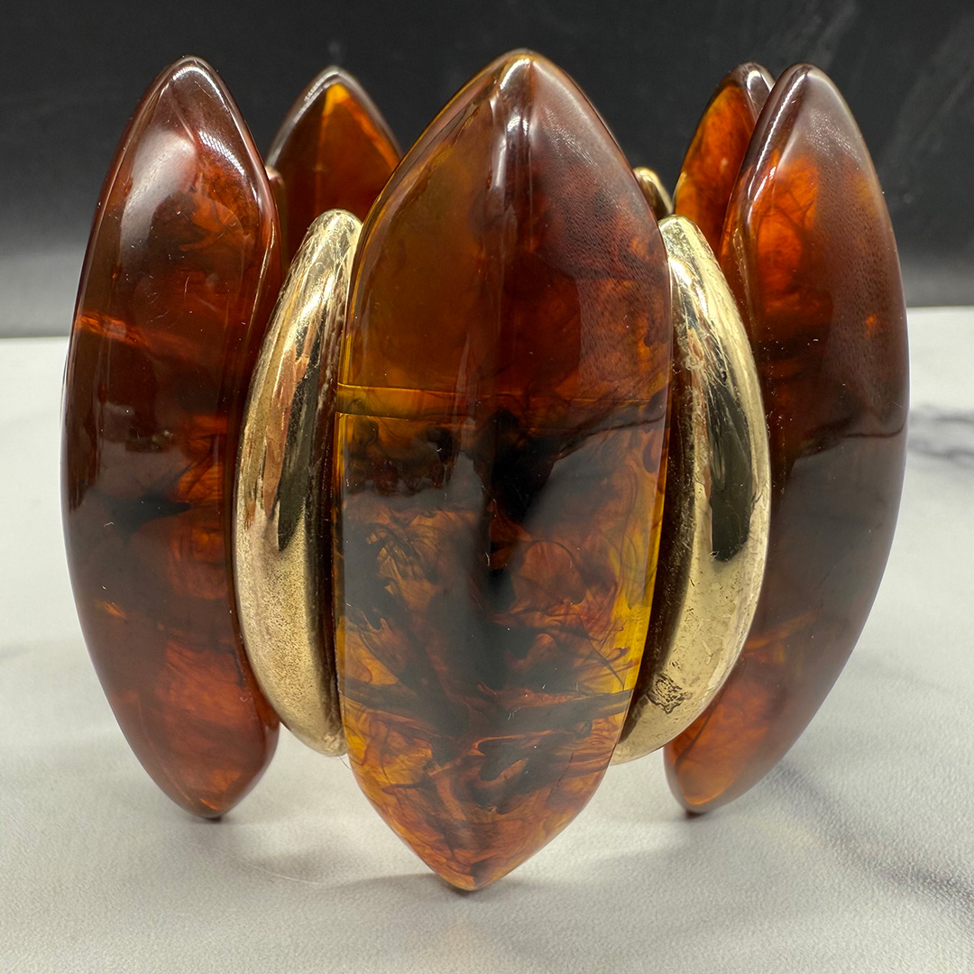 Amber-colored Lucite stretch bracelet.