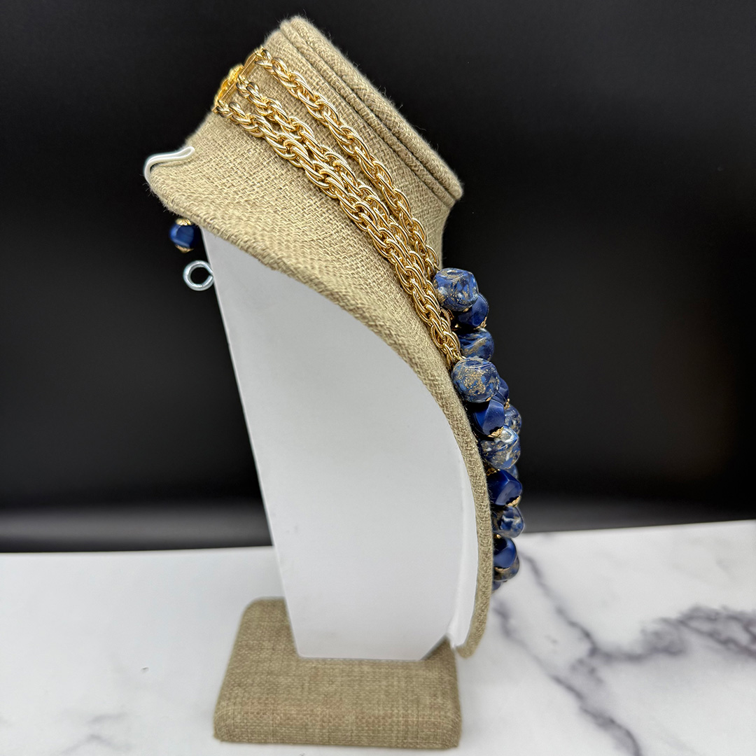 Coro triple-strand bead bib necklace.