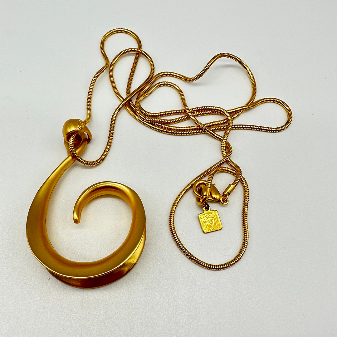 Vintage Anne Klein curlicue pendant necklace.