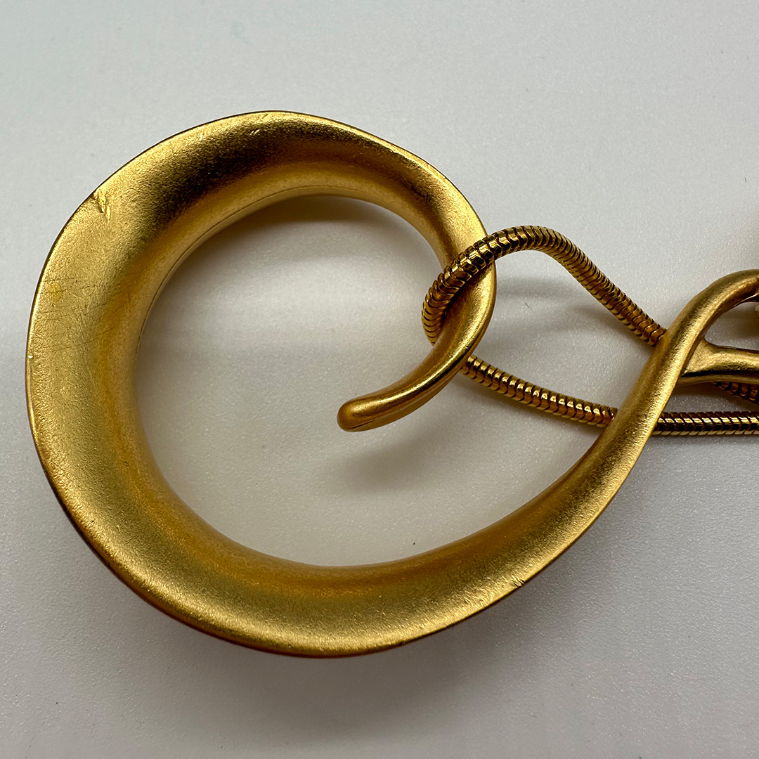 Vintage Anne Klein curlicue pendant necklace.