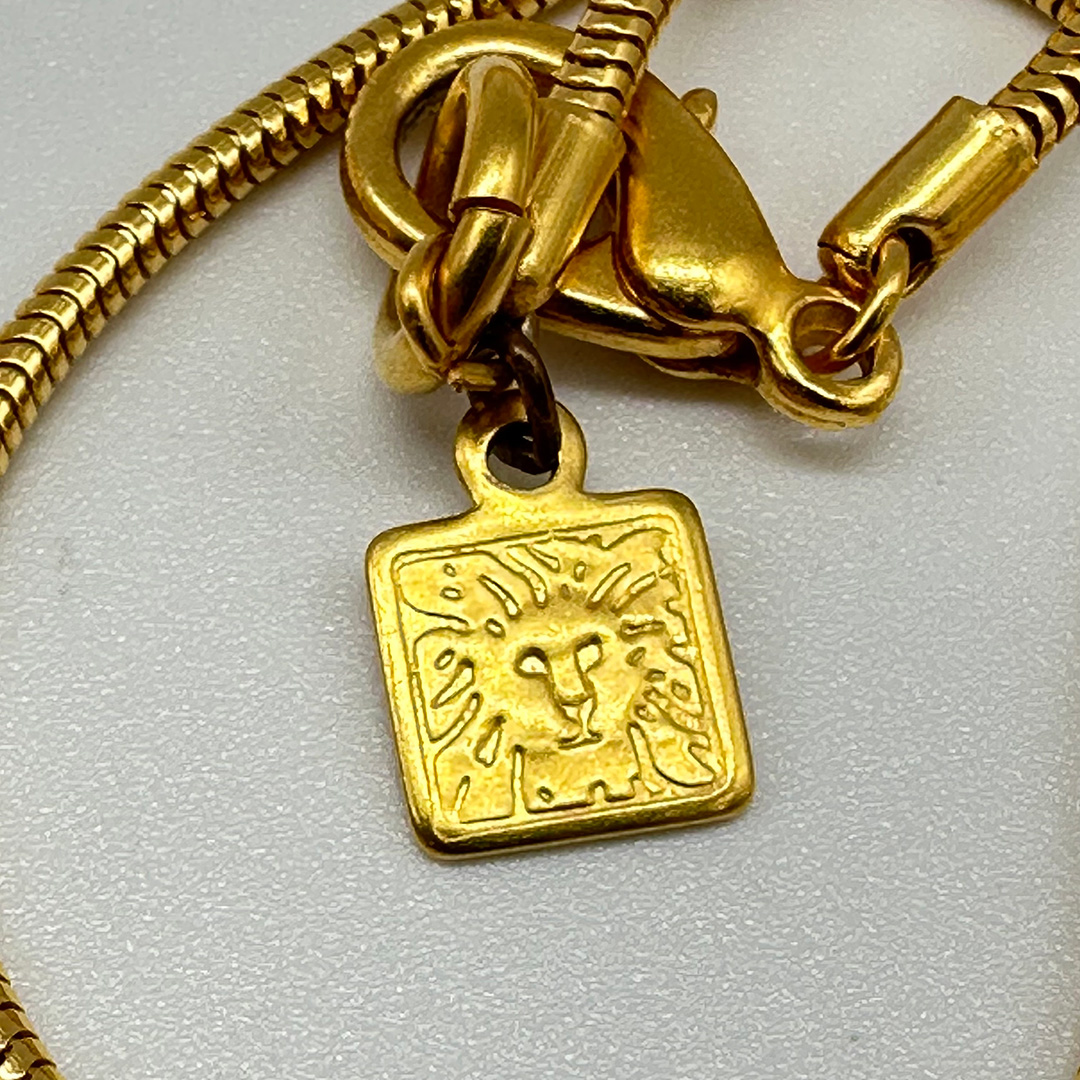 Vintage Anne Klein curlicue pendant necklace.