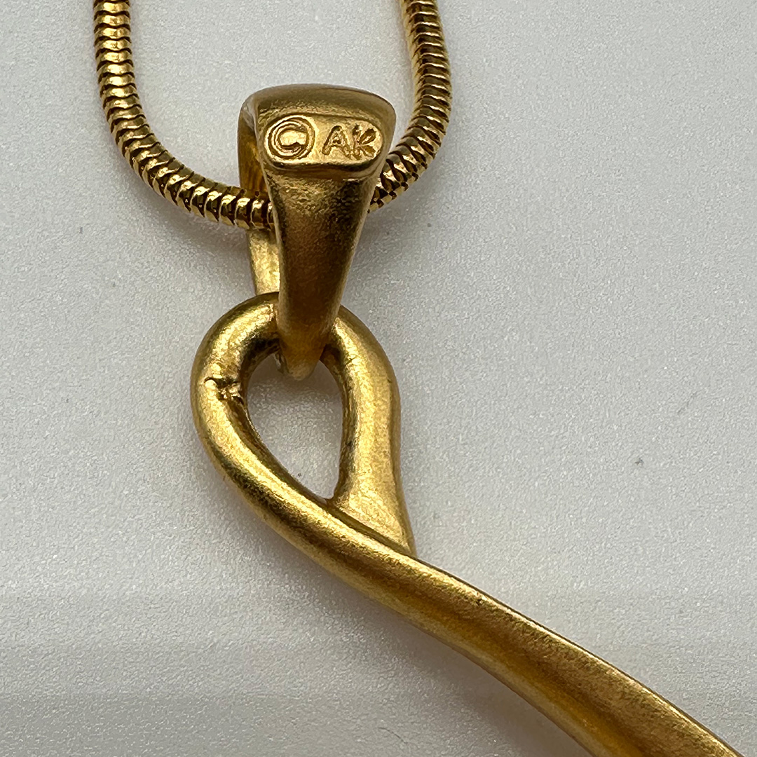 Vintage Anne Klein curlicue pendant necklace.