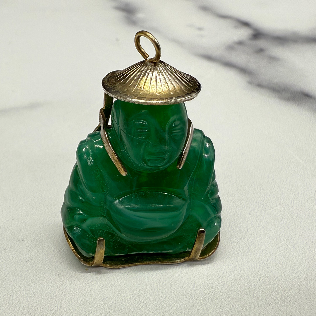 Vintage hard resin Asian charm.