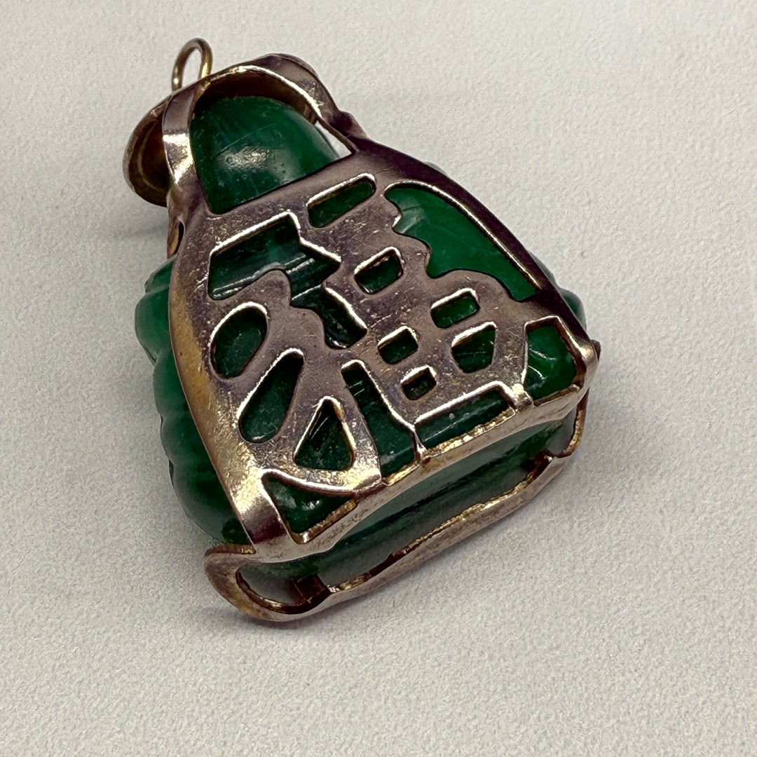 Vintage hard resin Asian charm.