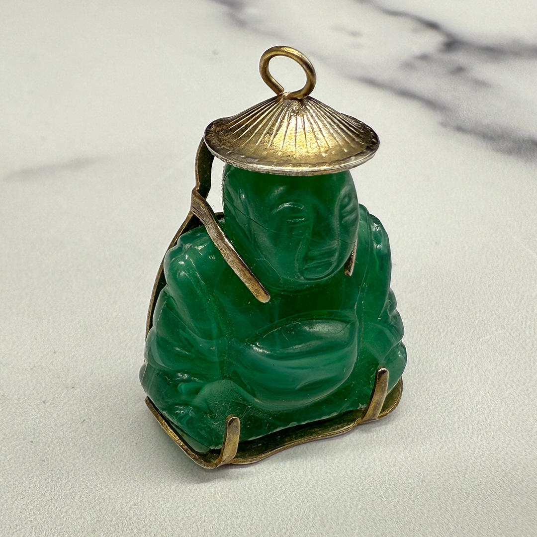 Vintage hard resin Asian charm.