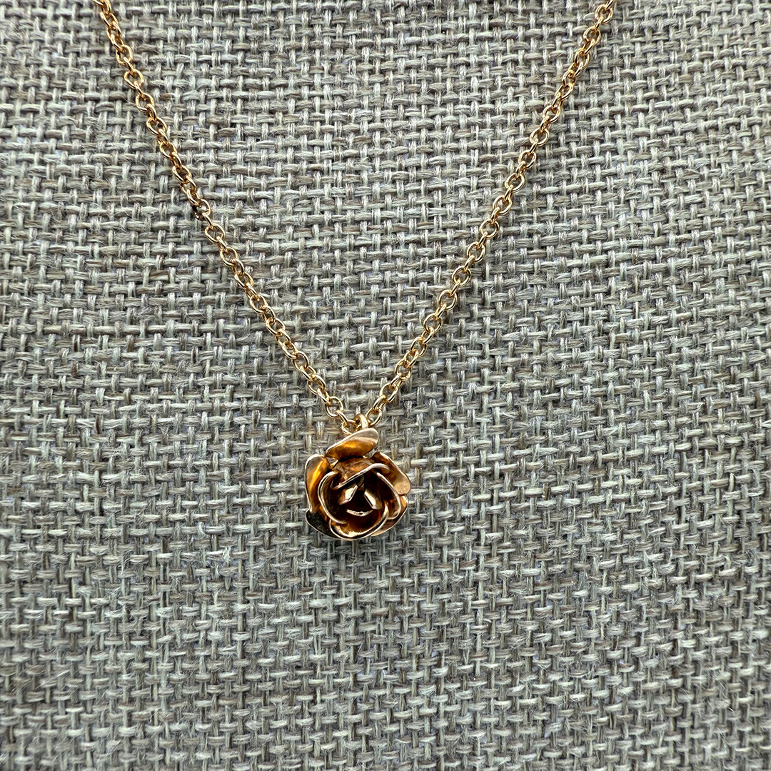 Rose pendant necklace.