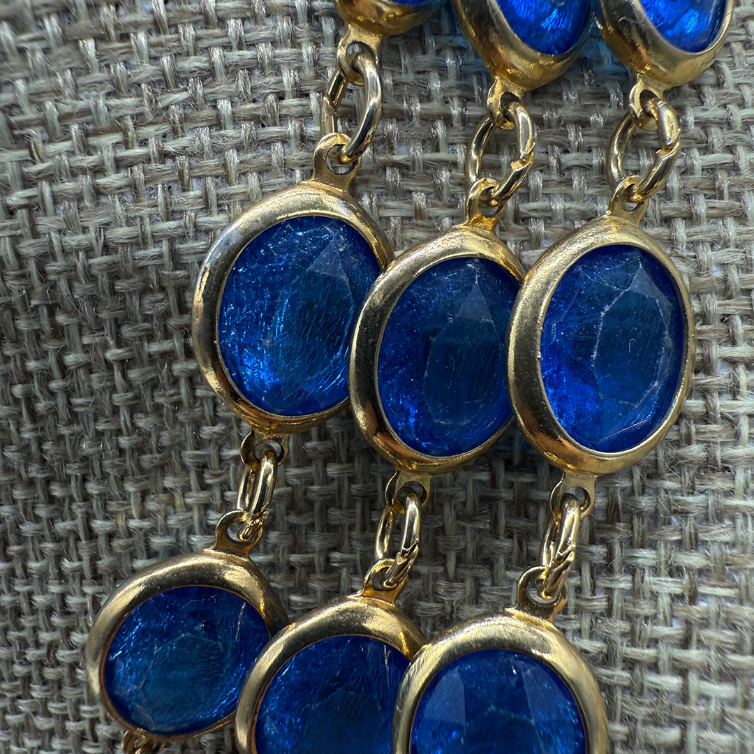 Triple-layer Coro-style bezel-set necklace.