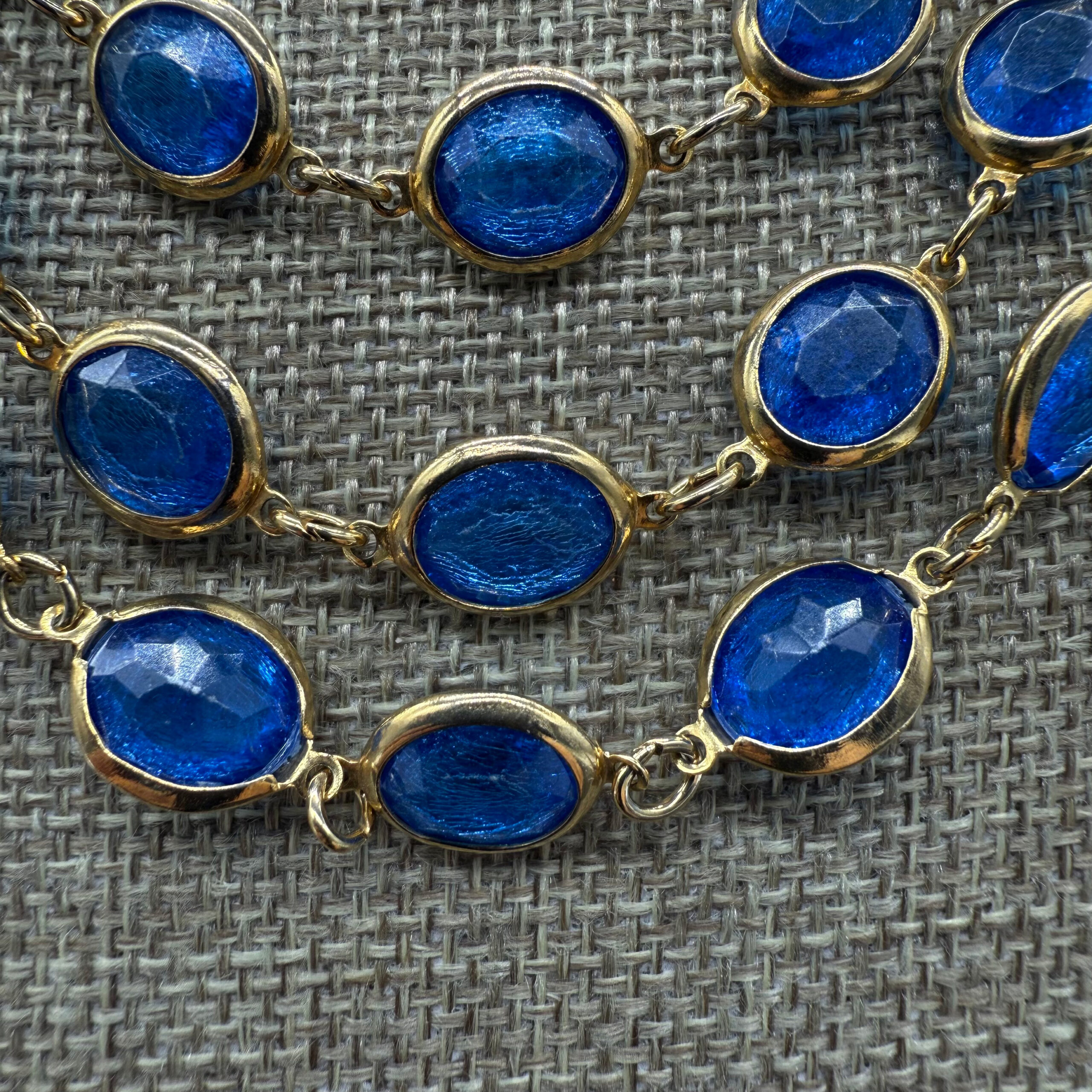 Triple-layer Coro-style bezel-set necklace.