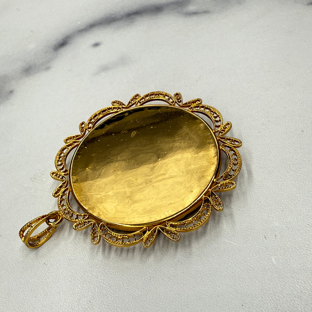Beautiful gold Damascene pendant.