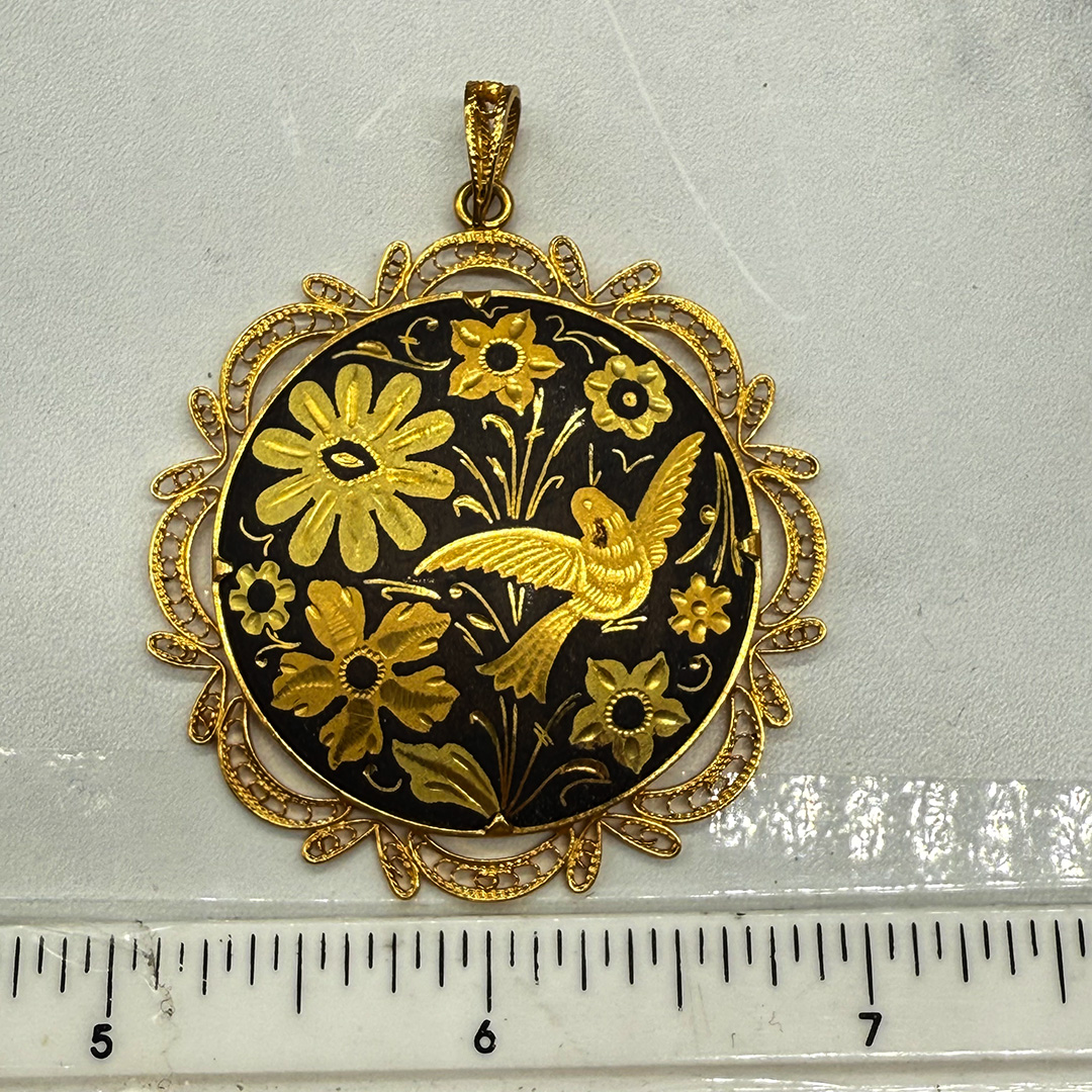 Beautiful gold Damascene pendant.