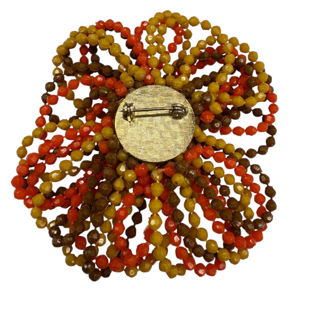 West German fall color stylized flower brooch.