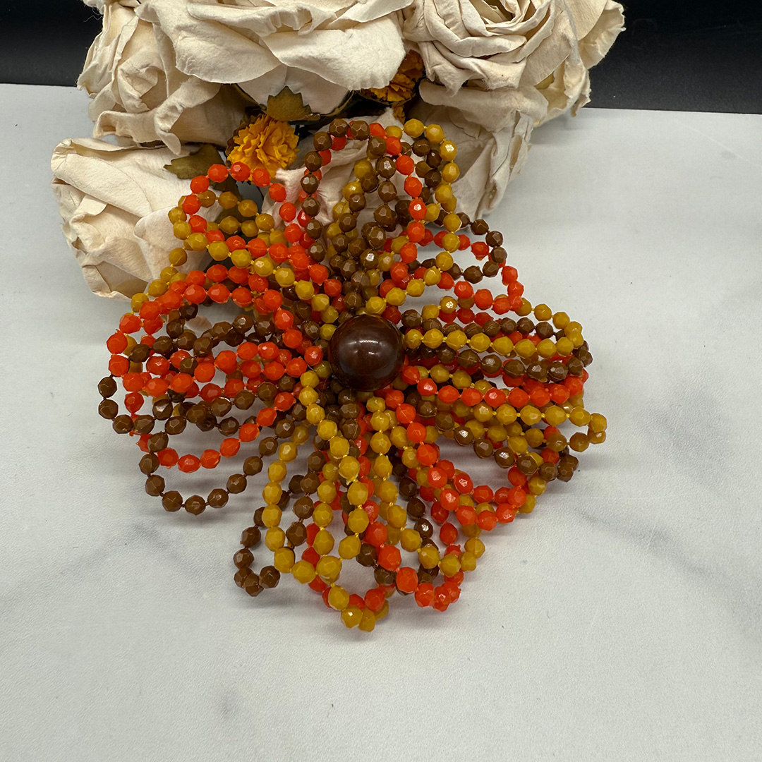 West German fall color stylized flower brooch.