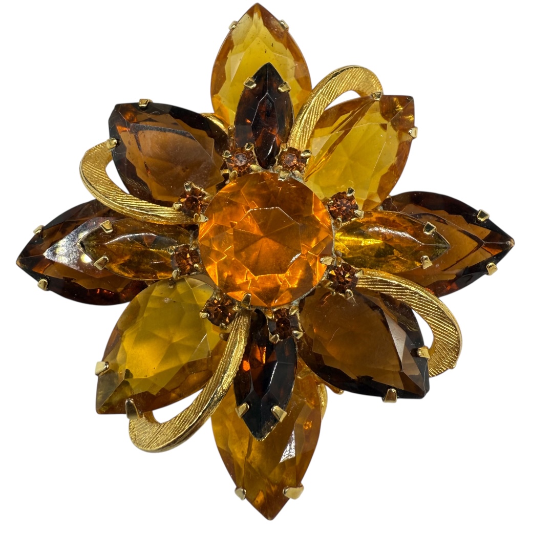 Wonderful amber-colored rhinestone brooch.