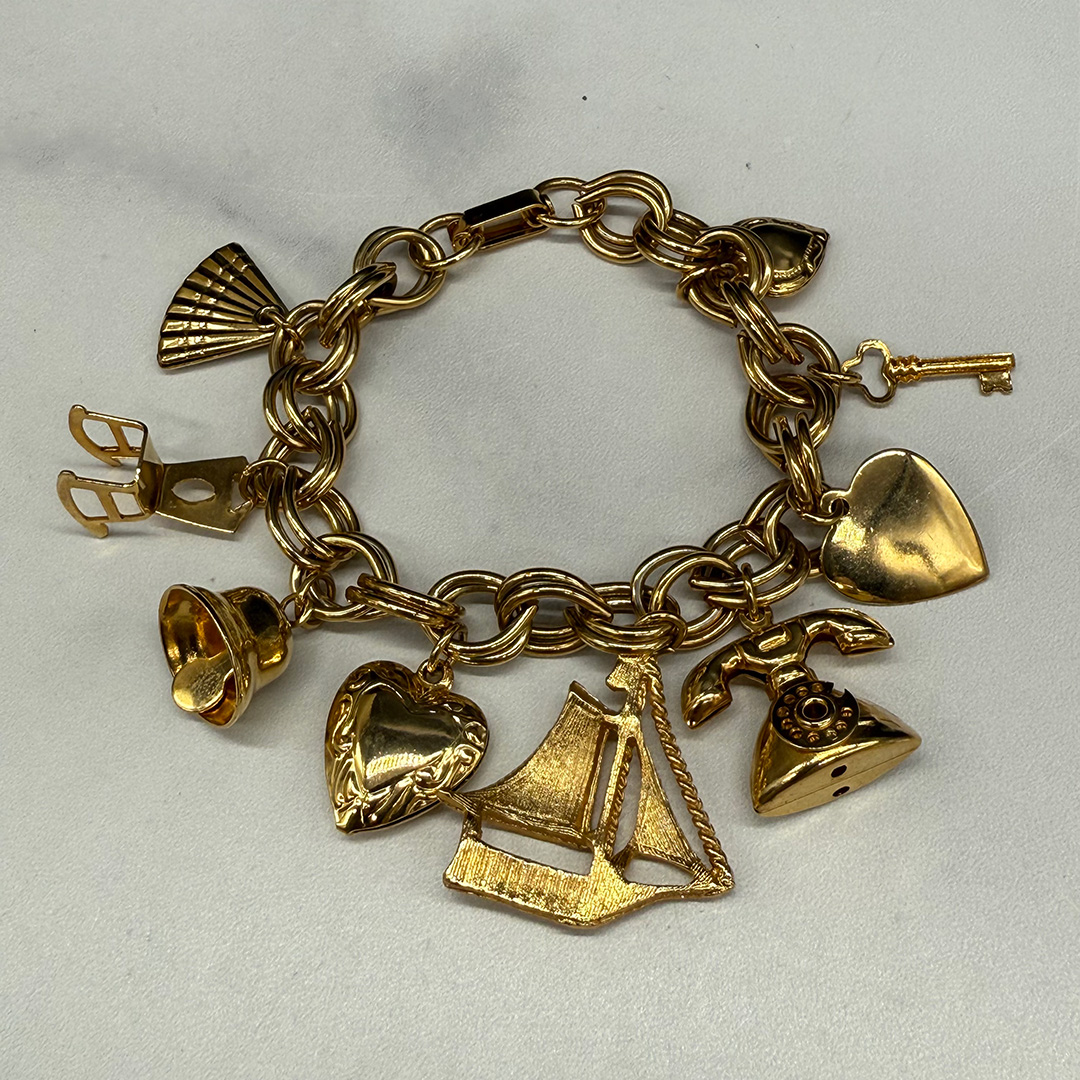 Fabulous Coro-style 1950s charm bracelet.