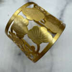 Vintage floral cuff with open-metalwork.