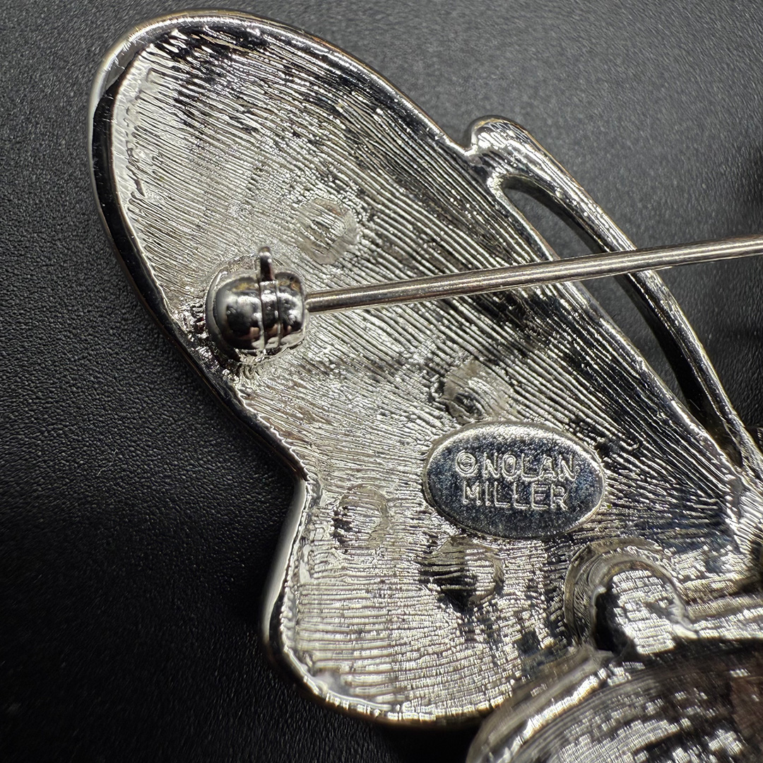 Nolan Miller butterfly brooch mark.